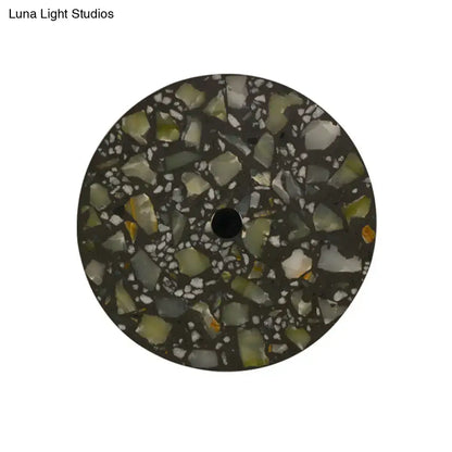 Circular dark green terrazzo wall sconce with light green white and orange fragments for living room led wall light