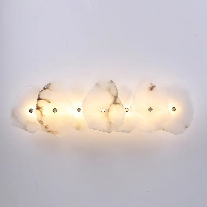 A modern four-light wall sconce with elegant marble led cloud-like off white shades for bedroom decorbites elegant marble decor