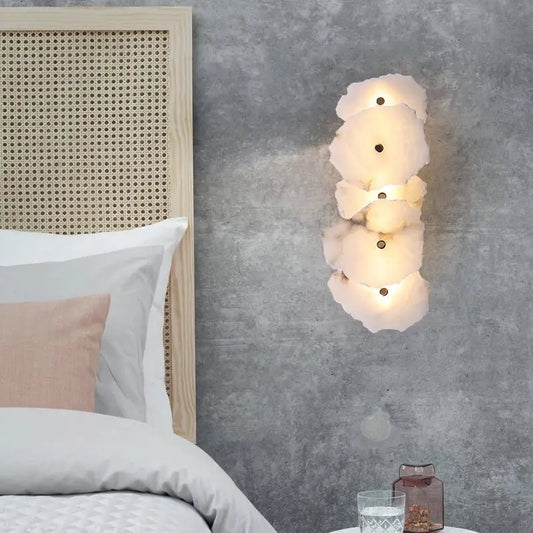 Art deco off white marble led wall sconce with layered organic design and embedded lights for elegant bedroom decorbites elegant marble decor