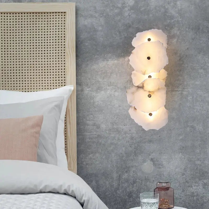 Art deco off white marble led wall sconce with layered organic design and embedded lights for elegant bedroom decorbites elegant marble decor