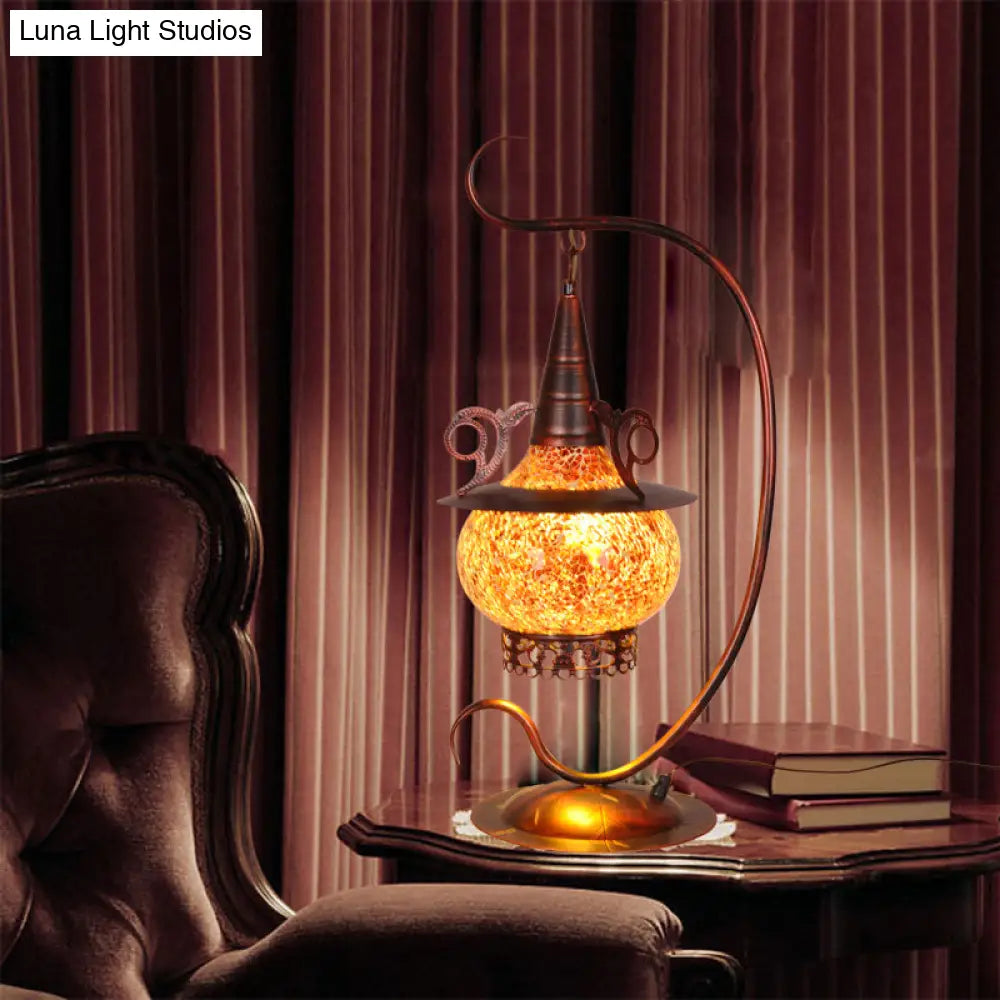 Lámpara de noche Art Déco de cristal naranja con forma de estufa y brazo rizado