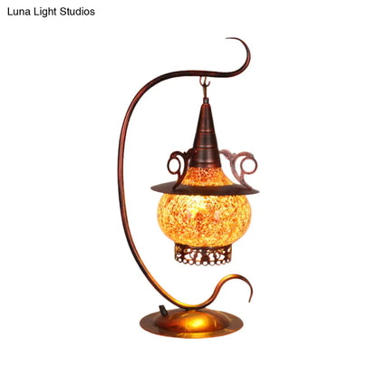 Lámpara de noche Art Déco de cristal naranja con forma de estufa y brazo rizado