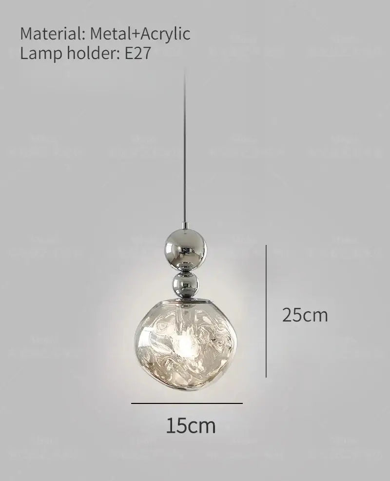 Art deco silver lava pendant light with clear textured acrylic globe and polished metal spheres for living room