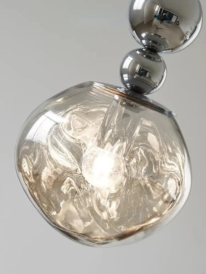 Art deco silver lava pendant light with textured smoked glass globe and polished chrome spheres for living room LED bulb