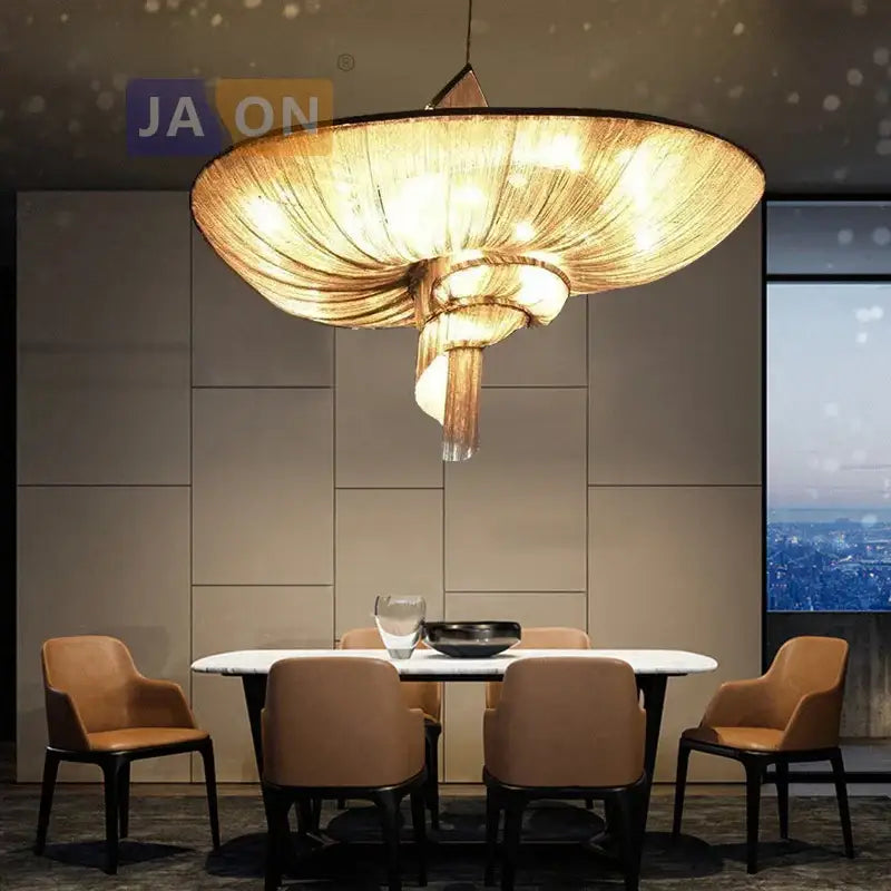 Golden intricately woven art deco vintage pendant lights with modern spiral design hanging above dining table decorbites