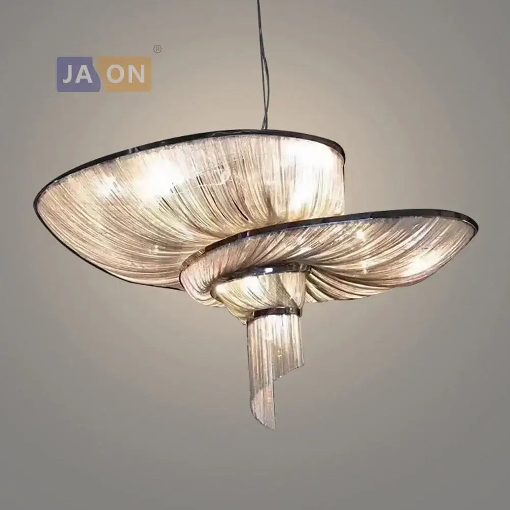 Modern two-tiered art deco vintage pendant lights with translucent glass shades and black metal framing for dining room decorbites