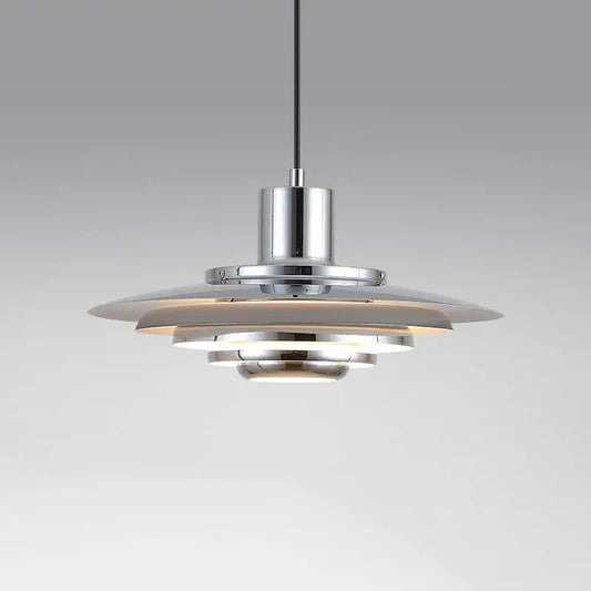Art deco pendant light with chrome finish and concentric aluminum shades ideal for dining rooms under 20 square meters