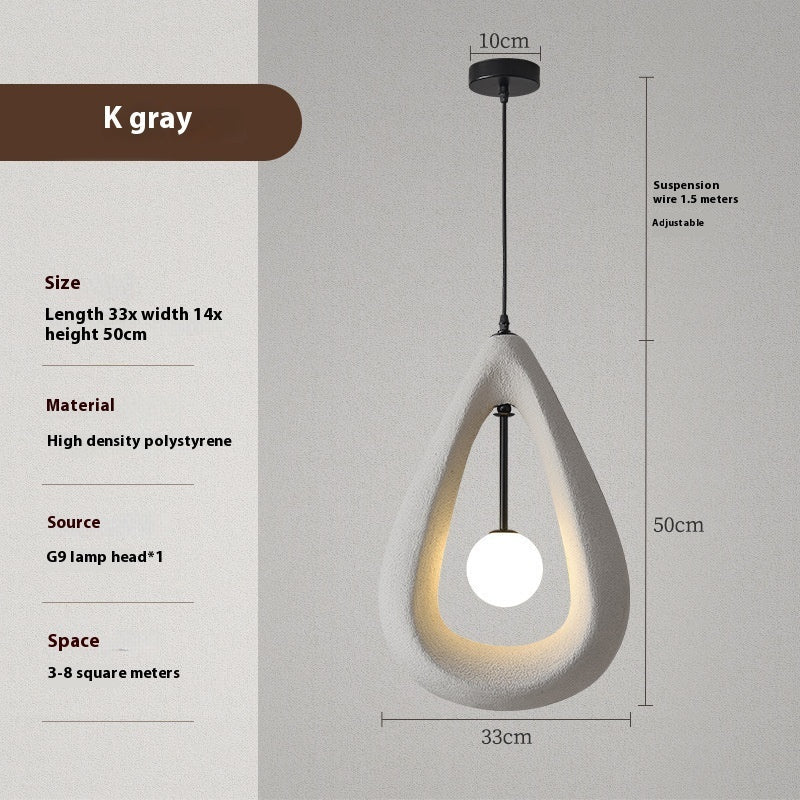 Teardrop-shaped pendant light in k gray, made of high-density polystyrene with a g9 lamp head.