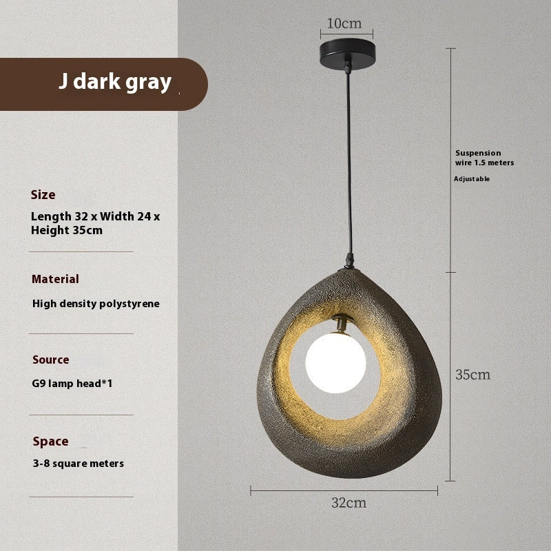 Dark gray pendant light with a textured surface, high-density polystyrene material and g9 lamp head.