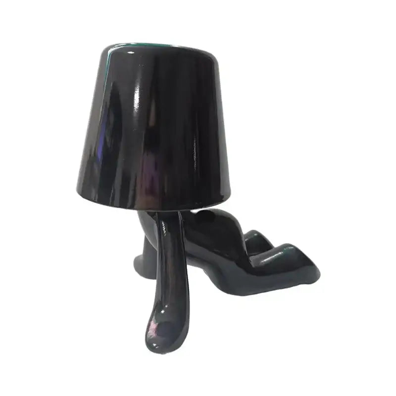 Black glossy man table lamp with lampshade head and high heel legs as articulated golden man night light for bedroom
