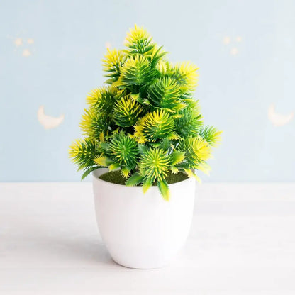 A vibrant artificial bonsai tree with green and yellow foliage in a white ceramic pot for garden decor