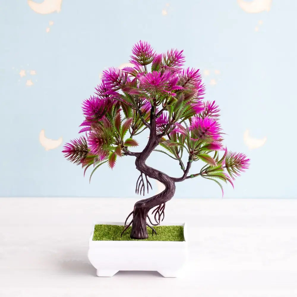 A vibrant purple and green artificial bonsai tree with twisted dark brown trunk in white rectangular pot with faux moss