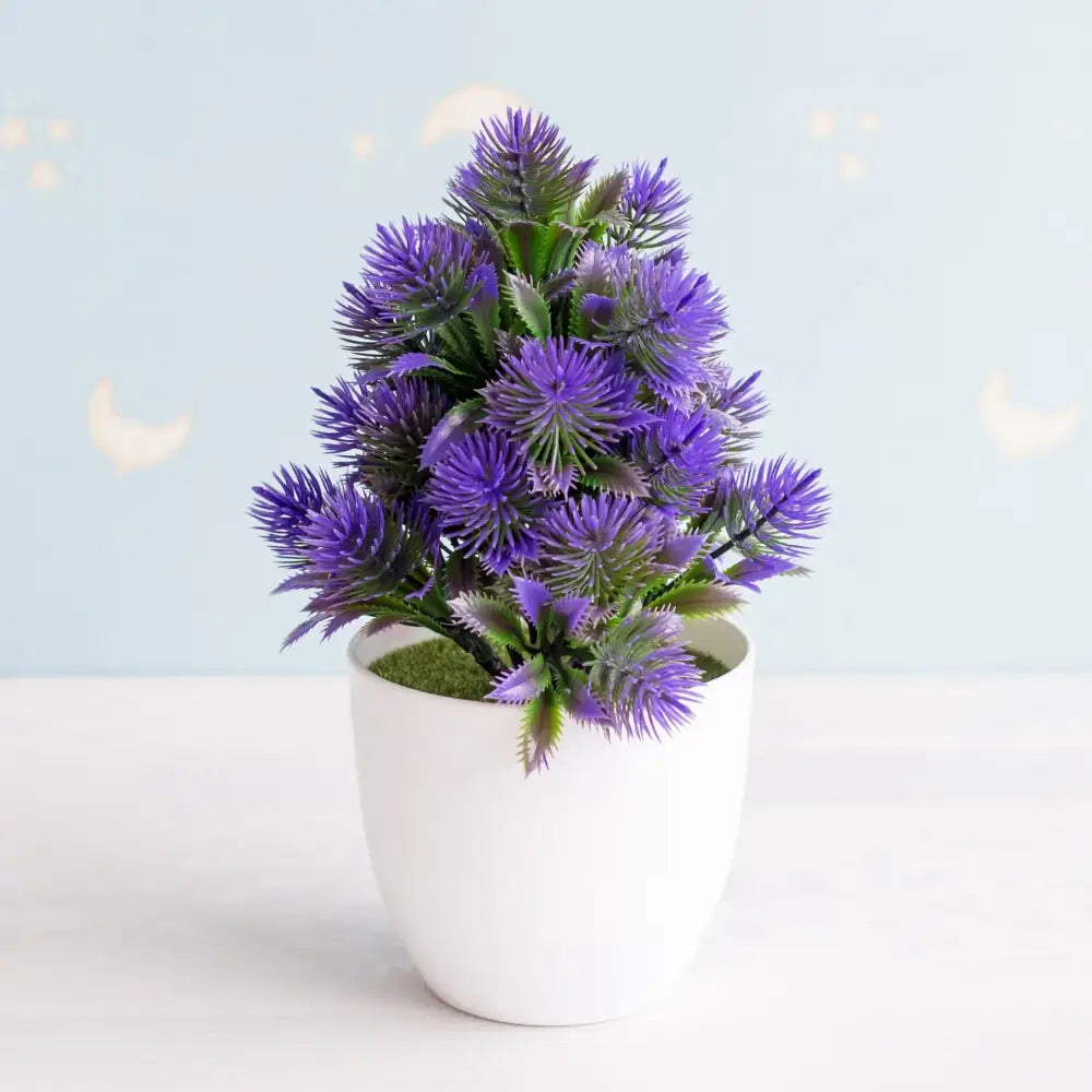 A vibrant purple artificial bonsai tree with spiky blooms and green foliage in a white ceramic pot for garden decor