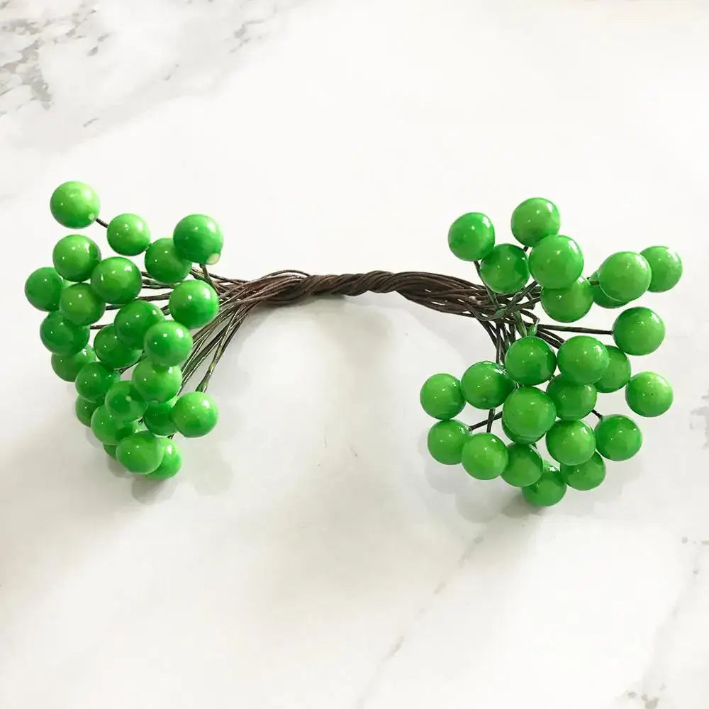Artificial green plant flower cherry berries bundle featuring bright green glossy plastic grape clusters on twisted wire stem decorbites green plant