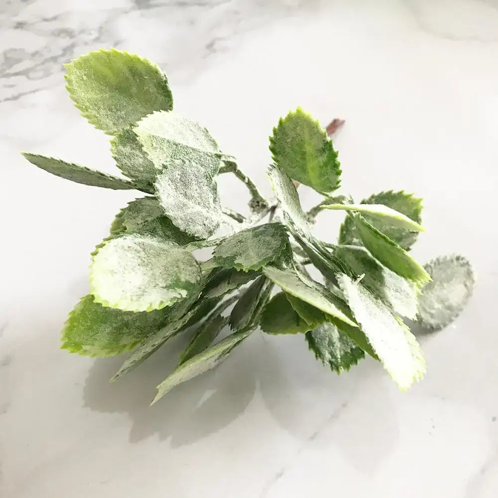 Frosted green artificial foliage with delicate leaf shapes in a decorbites green plant flower cherry bundle for living room decor