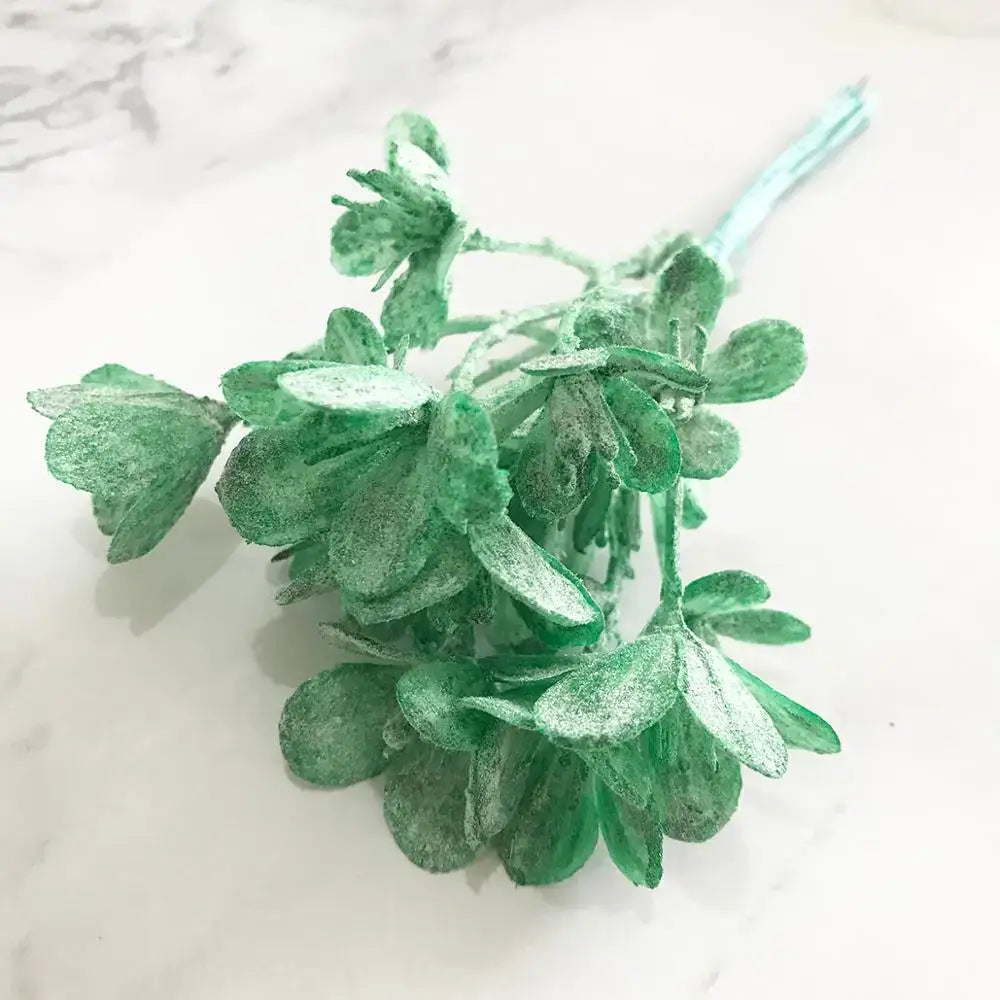A delicate artificial green plant flower cherry berries bundle with frosty textured finish for decorbites green plant decor