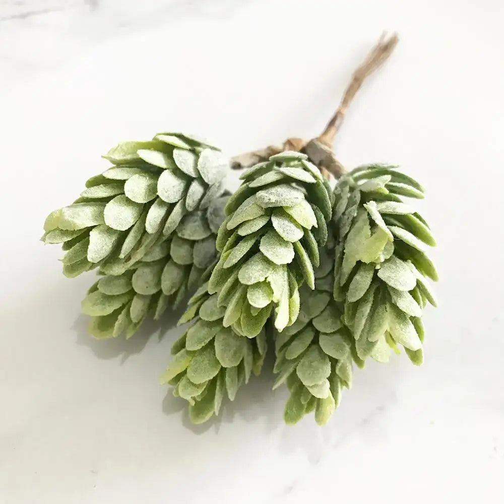 Faux green pinecone cluster with frosted texture and natural wood stem in decorbites green plant flower cherry bundle decor