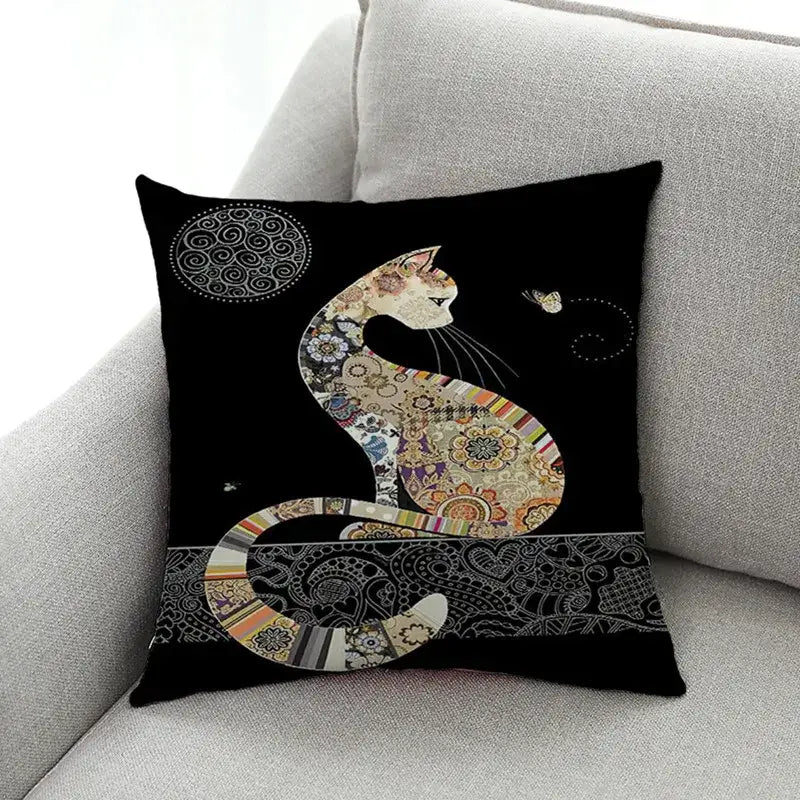 Black throw pillow with artistic cat print featuring intricate patchwork patterns in earthy tones for living room decorbites cat print