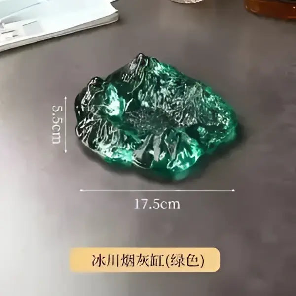 Artistic clear and gold decorbites iceberg glass dessert plate with a glossy green stone texture for dining room decor