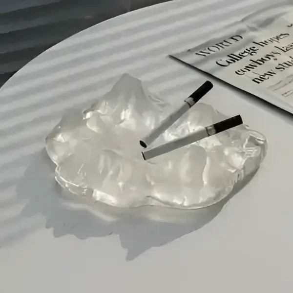 Artistic clear and gold decorbites iceberg glass dessert plate featuring a translucent resin ashtray with mountainous design