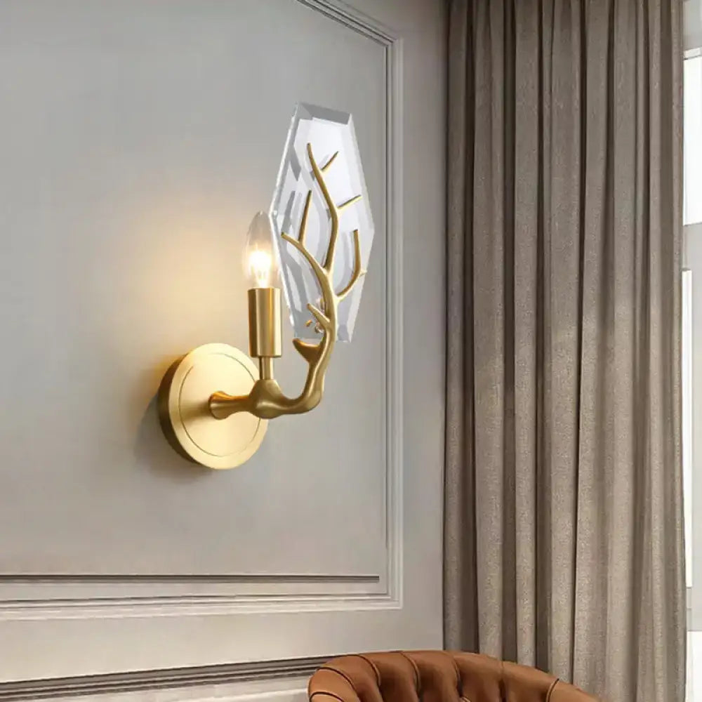 Artistic gold-toned antler wall lamp with faceted crystal shade light fixture for living room illumination