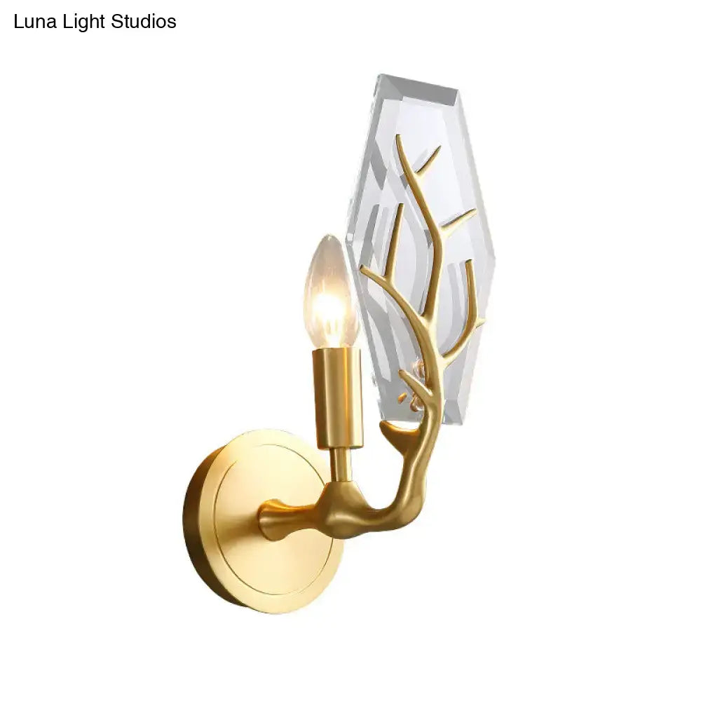 Artistic gold wall lamp with branching antler design and faceted crystal accent for living room light fixture