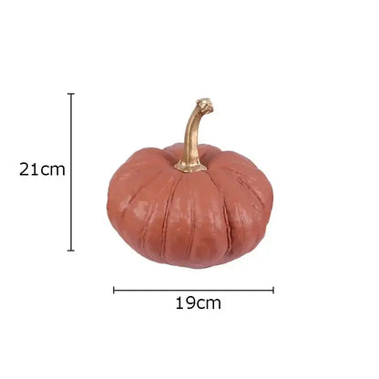 Terracotta textured pumpkin resin sculpture with gold stem for living room decor featuring decorbites gold pumpkin design