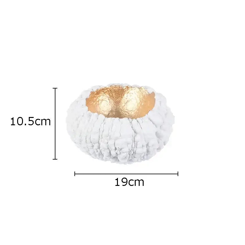 White textured ceramic planter with gold foil interior paired with decorbites gold pumpkin resin sculpture decor