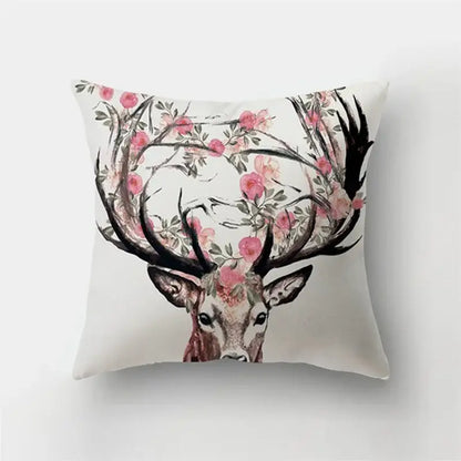 White short plush throw pillow with decorbites deer animal featuring black antlers and pink flowers for bedroom decor