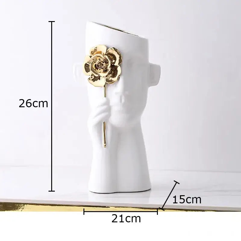Artistic white ceramic head vase with gold rose relief decoration on the cheek for bedroom decor