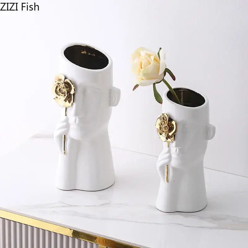 Artistic white ceramic torso vases with gold rose relief accents designed for bedroom decor