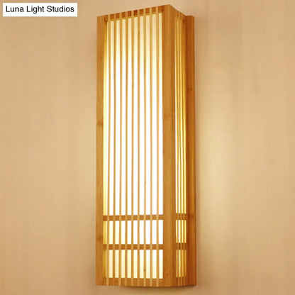 As an AI language model, I can suggest a revised product title that maintains the essential information while being more concise and SEO-friendly:

"Beige Asian Style Wooden Wall Sconce - Rectangular Single Bulb Mount for Bedroom Lighting