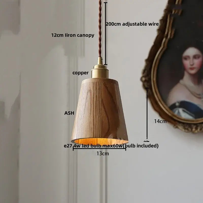 Ash wood dome pendant lamp with warm tone, copper-finished top, and twisted bronze wire suspension decorbites ash wood