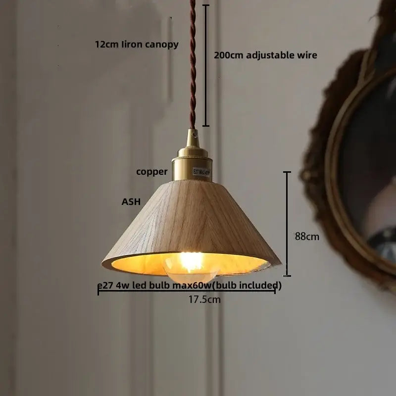 A warm-toned ash wood dome pendant lamp with brass hardware perfect for kitchen decor from decorbites ash wood