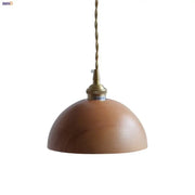 Warm-toned ash wood dome pendant lamp with brass fixture and twisted cord for kitchen decorbites ash wood lighting