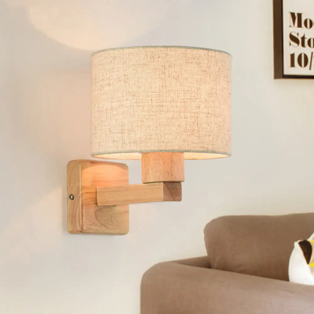 Lámpara de pared de tambor de inspiración asiática con brazo de madera y pantalla de tela, 1 luz, para dormitorio