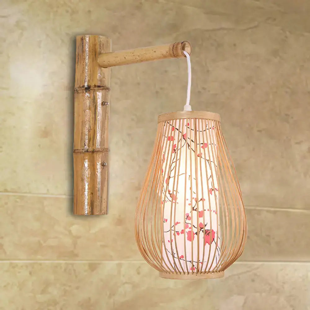 Asian pink cherry blossom bamboo teardrop sconce wall lamp made of natural woven bamboo for bedroom use