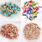 Assorted colorful heart mini wooden clips in natural wood tones with blue pink red yellow green and purple accents for decor