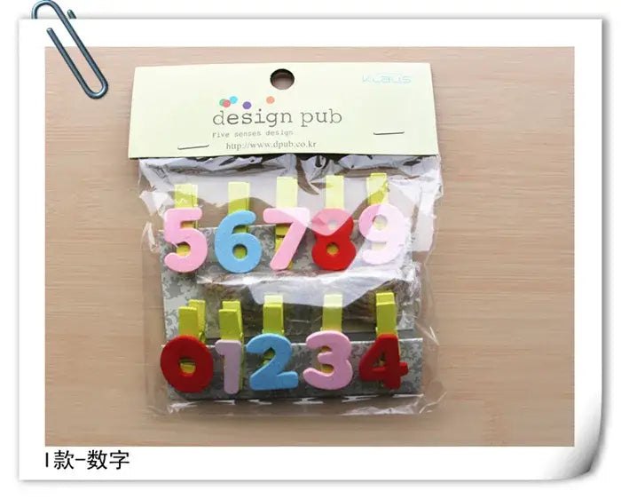 Assorted colorful foam number mini wooden clips in pink blue red and yellow for bedroom photo decor in clear package