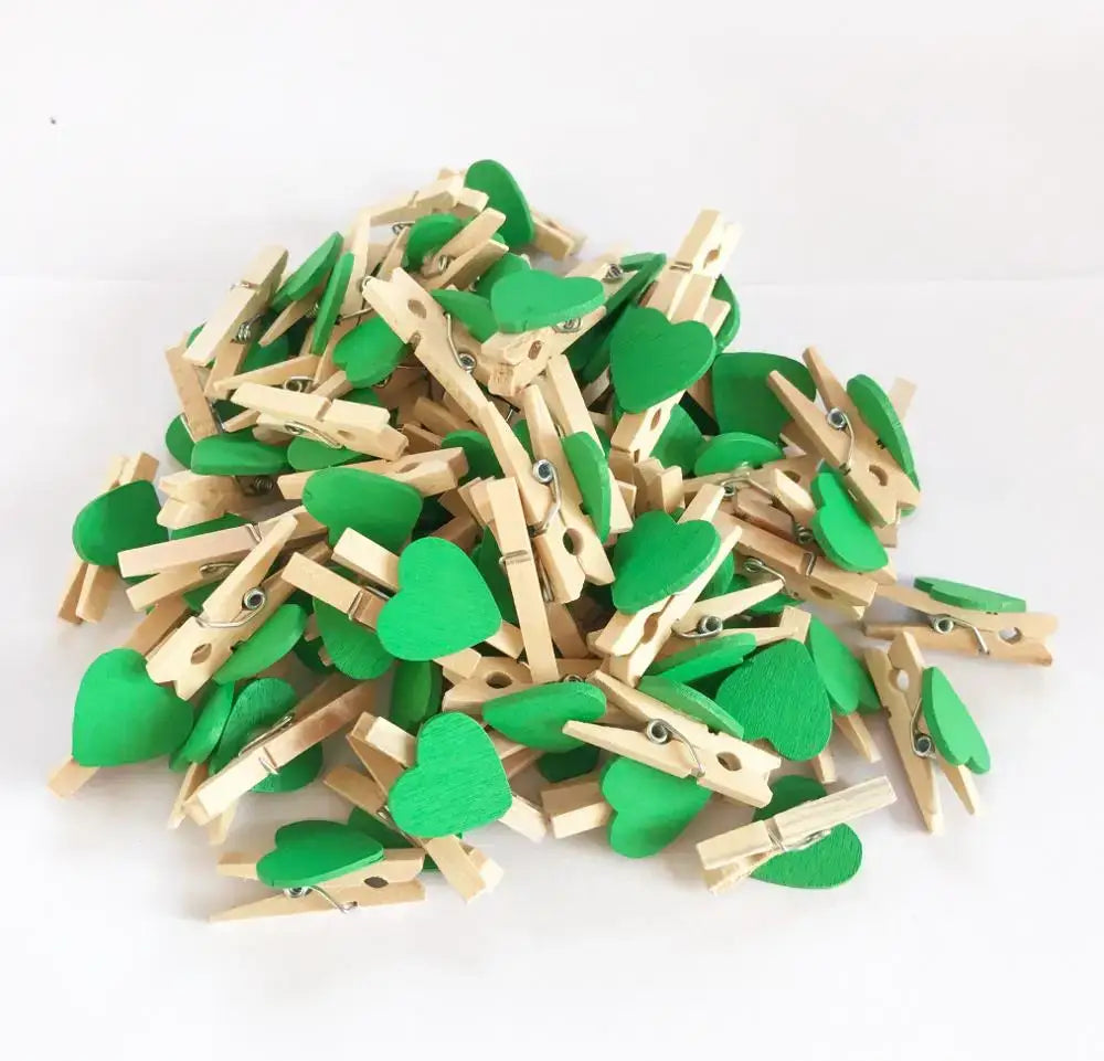Green heart-shaped wooden clips with natural wood bodies for assorted colorful mini wooden clips bedroom photo decor