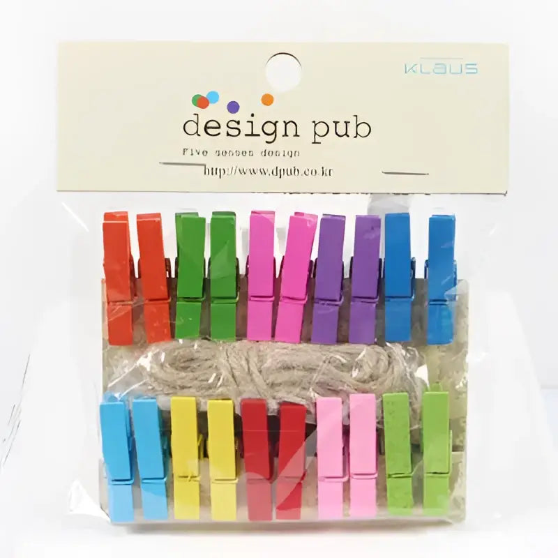 A set of assorted colorful mini wooden clips in vibrant red green pink blue and yellow for bedroom photo decor