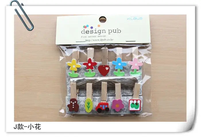 Set of assorted colorful mini wooden clips with painted flower and heart designs for bedroom photo decor