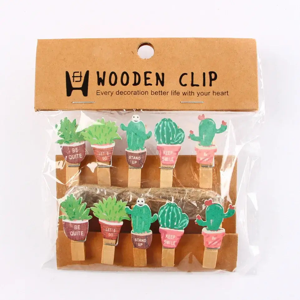 Set of ten mini wooden clips featuring green cactus in pink or brown pots with motivational phrases for bedroom decor