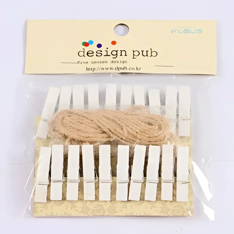 A set of ten white wooden mini clips with natural twine for bedroom photo decor and crafting use