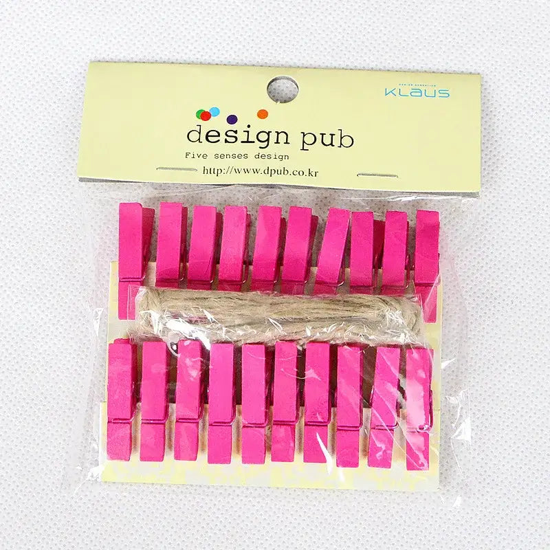 Vibrant pink mini wooden clips packaged with twine for bedroom photo decor and assorted colorful heart designs