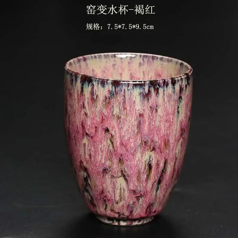 A ceramic kung fu tea cup with a swirling pink and cream crackle glaze from decorbites tea cups set