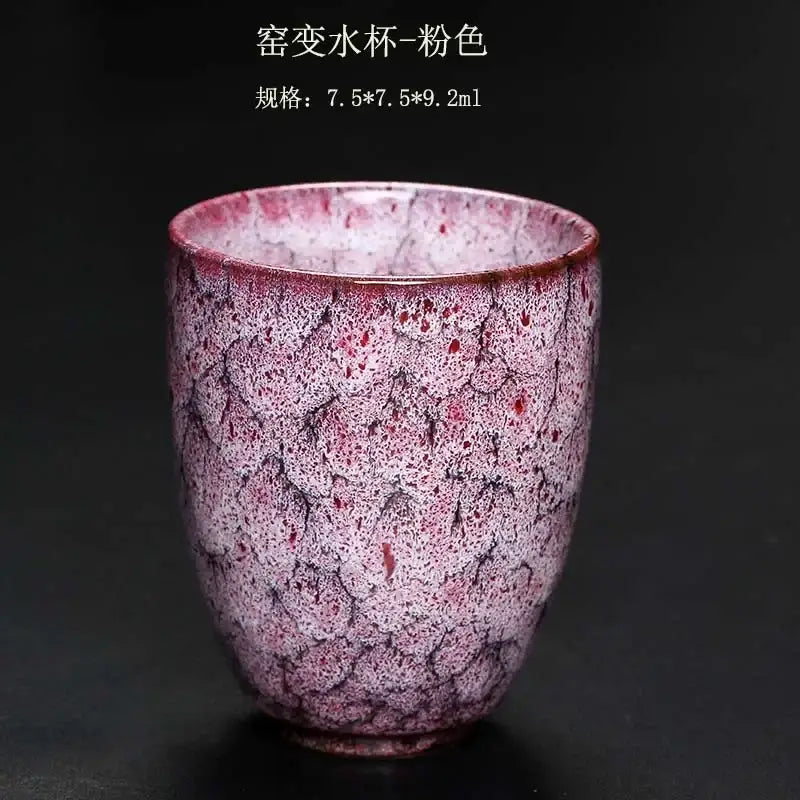 A pink ceramic kung fu tea cup with crackled speckled glaze and subtle red accents from decorbites ceramic kung set