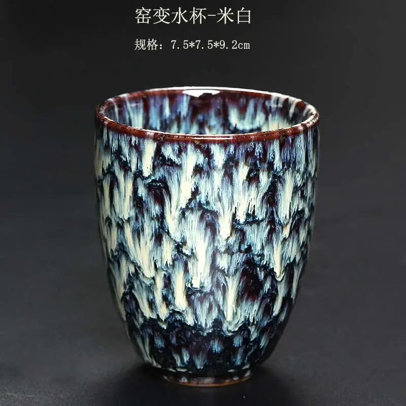 A ceramic kung fu tea cup with a deep blue white and brown crackle glaze from decorbites ceramic kung set