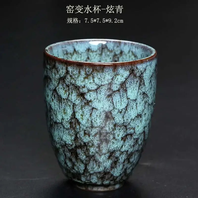 A teal and brown crackle glaze ceramic kung fu tea cup with organic texture from decorbites ceramic kung set