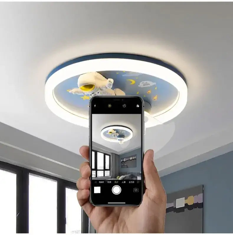 Circular led ceiling fan light with blue and white astronaut, moons, and stars design for bedroom space fixture